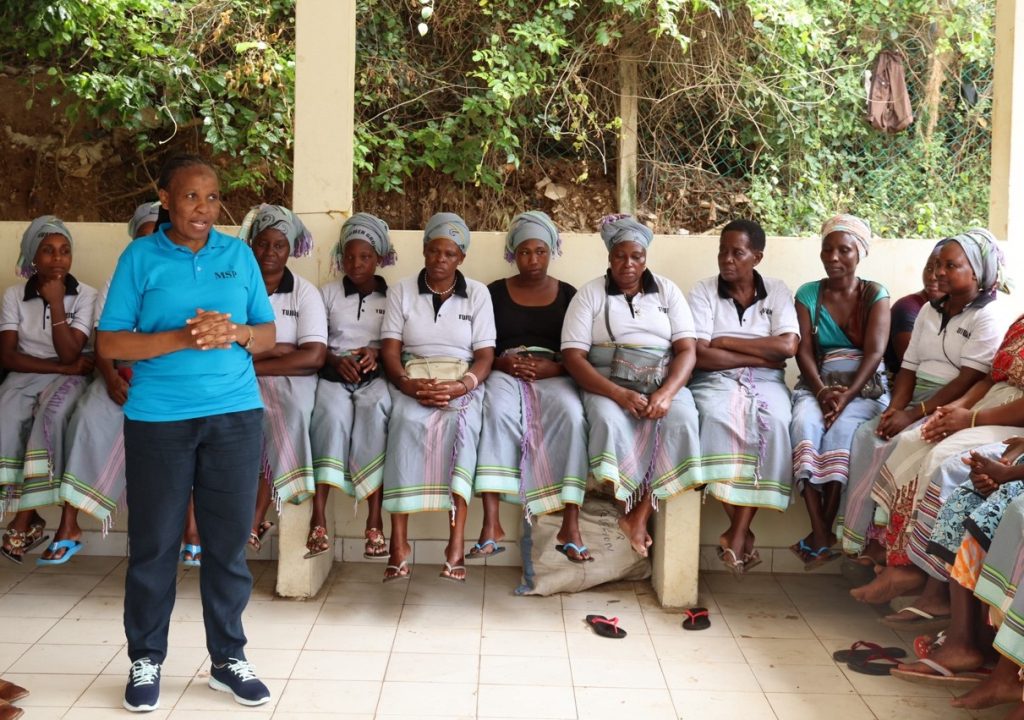 Director Susan Otieno addresses Pweza women’s group, a beneficiary of a KEMFSED grant for a boat to enable them venture into deep-sea fishing