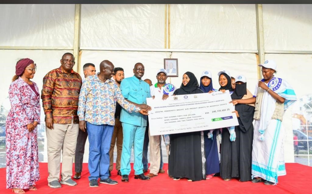 H.E. President William Ruto presents a cheque for Ksh245 million 